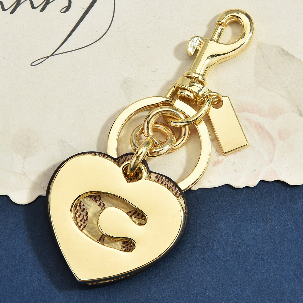 Breloque de sac en cuir motif  - Monogram Keychain Leather avis et prix